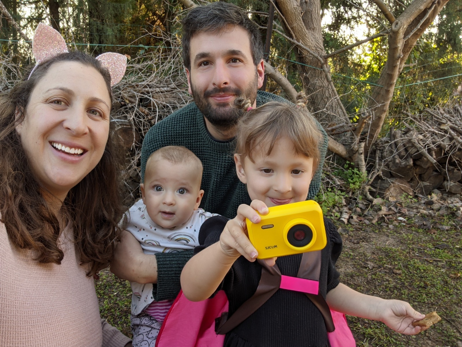 Amit Telem (top) and his family Photo: Courtesy